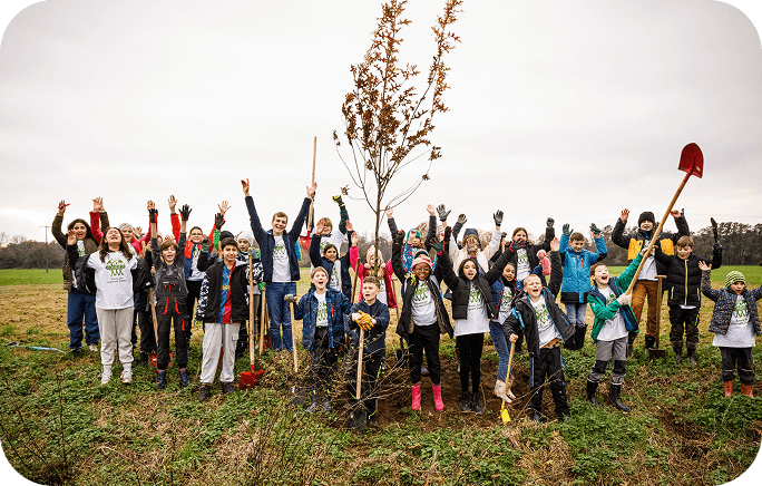 Children Planting Trees by Plant for the Planet