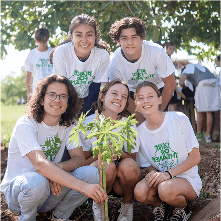 Felix and Ambassadors Planting a Tree by Plant for the Planet