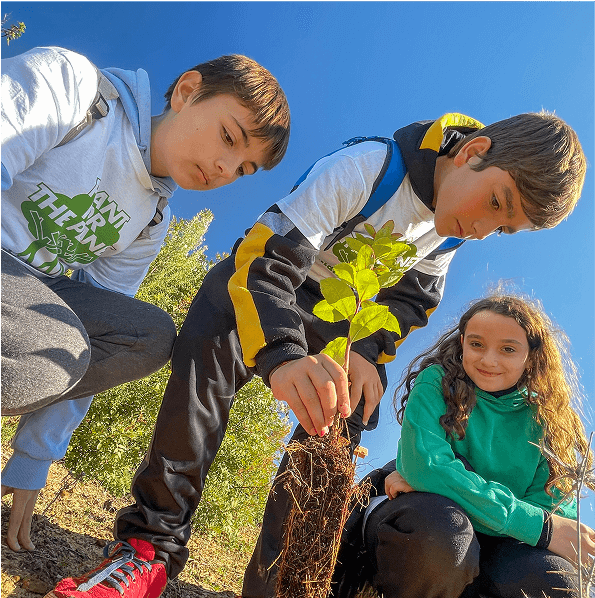 Young Ambassadors Planting by Plant for the Planet