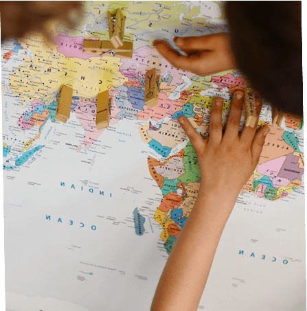 Ambassadors marking locations on world map by Plant-for-the-Planet.