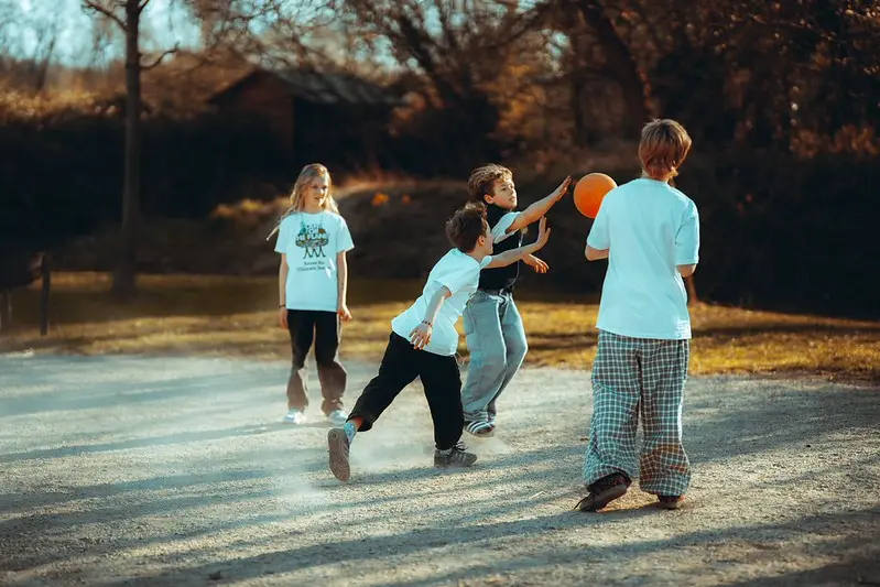 Ambassadors playing basketball by Plant for the Planet