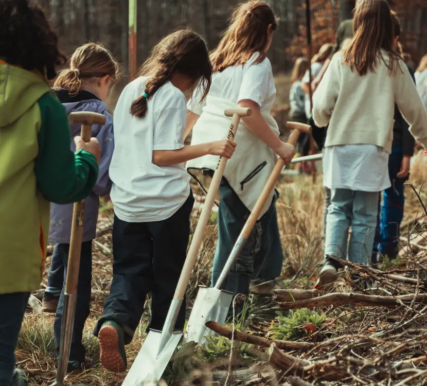 Ambassadors preparing tools for tree planting by Plant-for-the-Planet