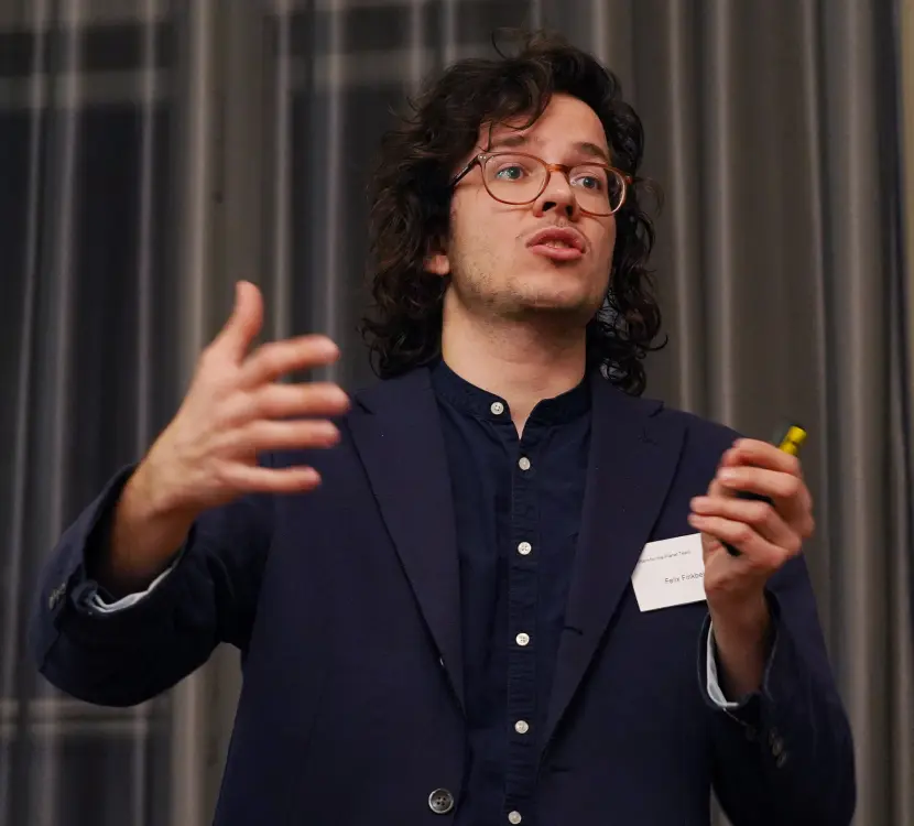 Felix giving a speech at a workshop by Plant-for-the-Planet