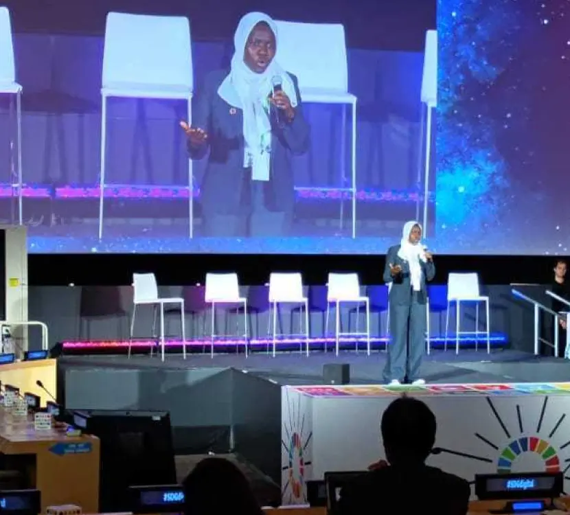 Fatou Jeng giving a speech at a conference by Plant-for-the-Planet