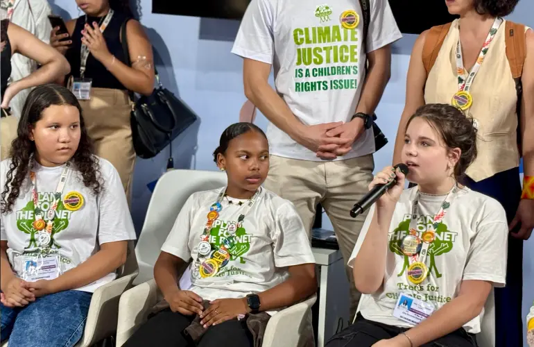 Ambassadors giving a speech at a event by Plant-for-the-Planet
